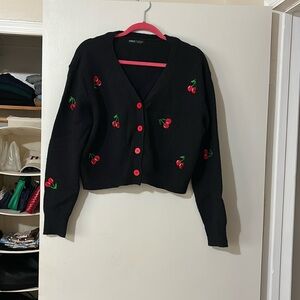 Black cropped sweater with embroidered cherries